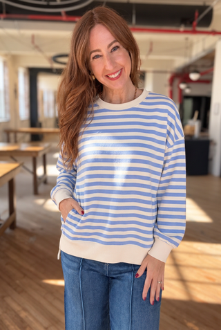 You wearing the cornflower-blue striped sweater with pockets