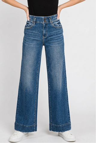 Afterglow jeans with a black tee, white sneakers and a mid-chest crop
