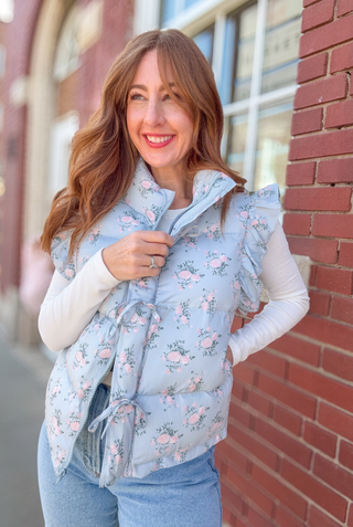 Blue floral vest with a white shirt
