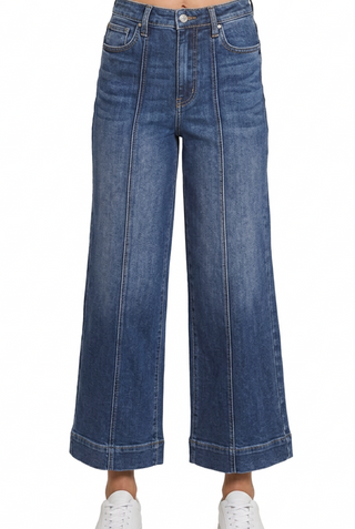 Jeans stock photo edited with white sneakers and no hanging tag