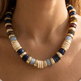 Model wearing the blue Marble Muse necklace